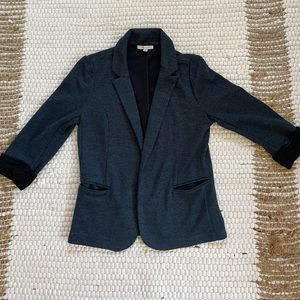 Blue rolled up tweed blazer